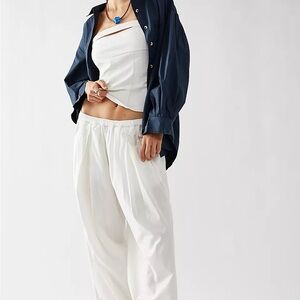 FREE PEOPLE MOVEMENT TO THE SKY PARACHUTE PANT - NILLA CREAM size L  New w/ tag